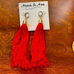Red tassel earrings. Never worn.